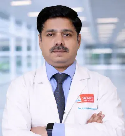 Dr. Karthigesan A M
